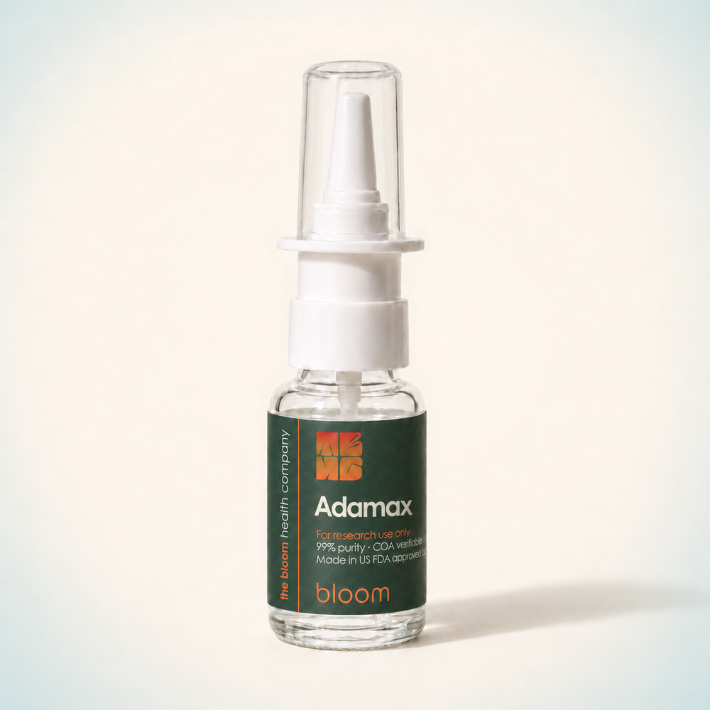 Bloom Adamax 10 mg nasal spray on warm ivory background with pale blue-green corners
