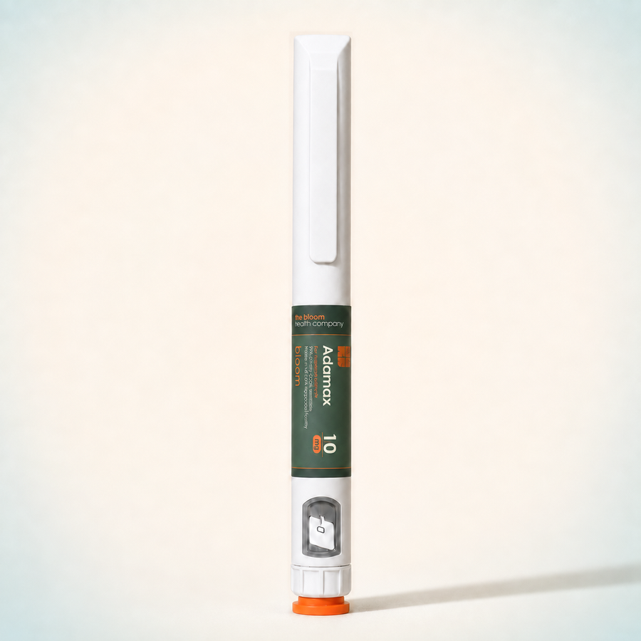 Bloom Adamax 10 mg prepared pen on warm ivory background with pale blue-green corners