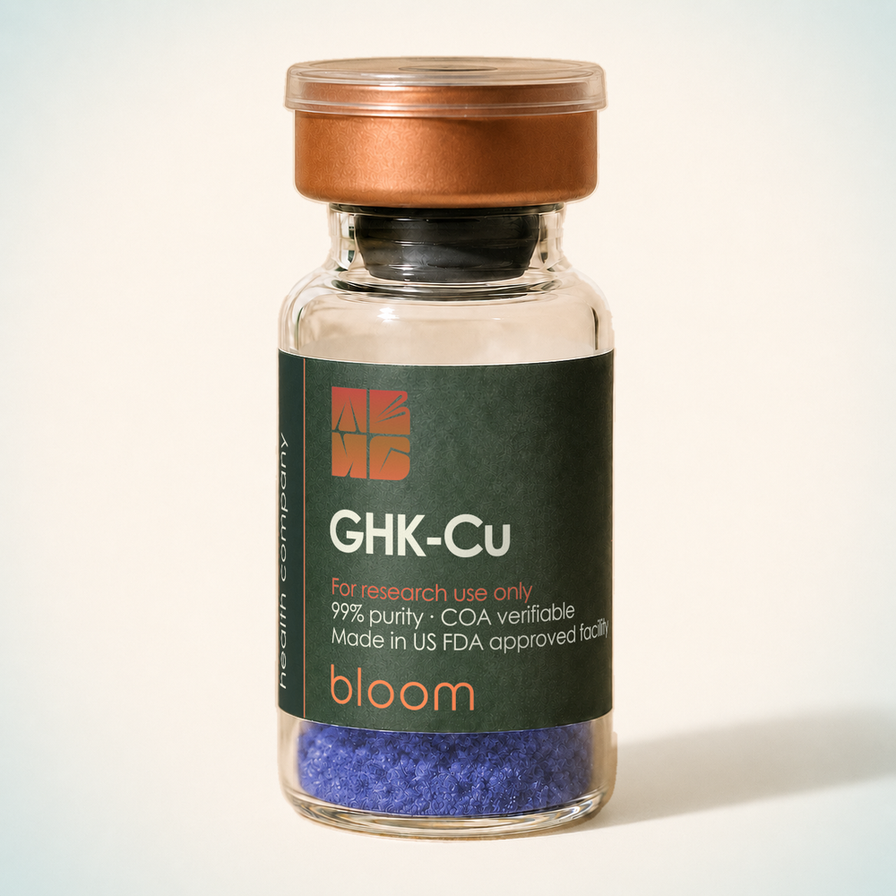 Bloom GHK-Cu vial on warm ivory background with pale blue-green corners