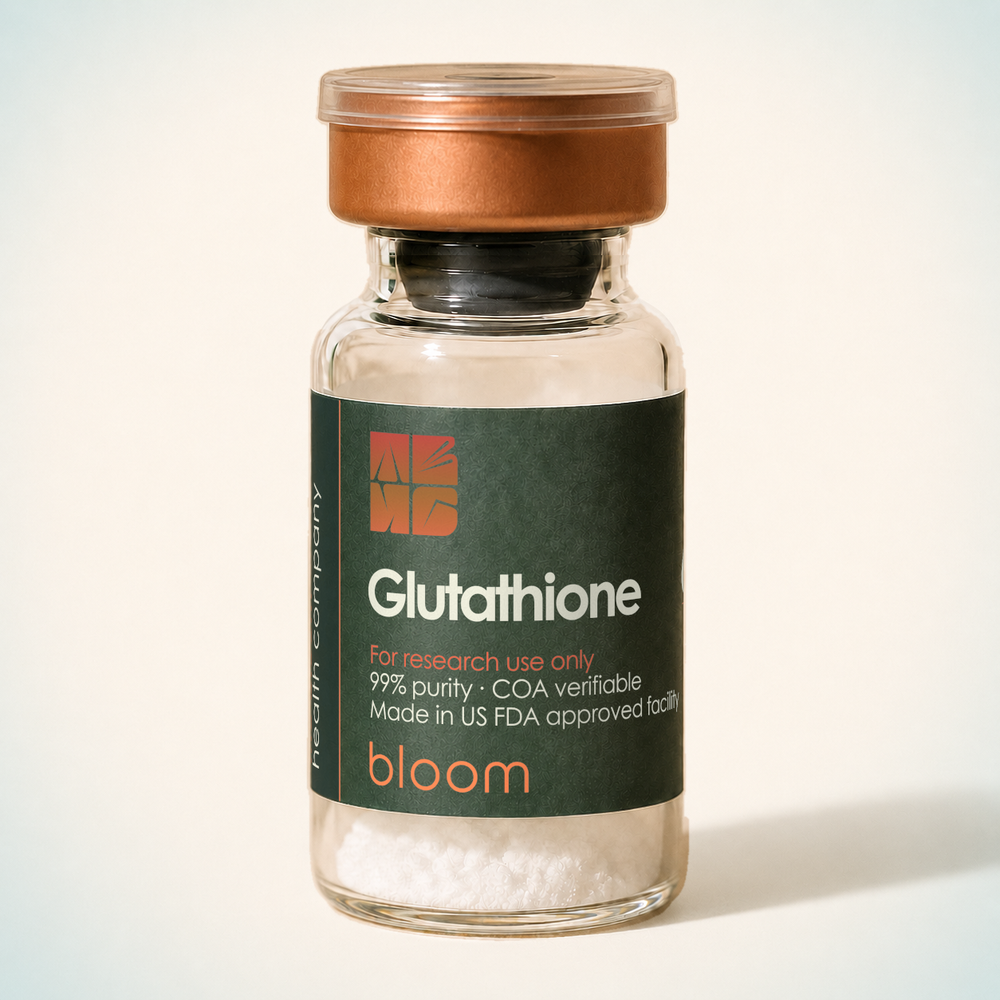 Bloom Glutathione vial on warm ivory background with pale blue-green corners