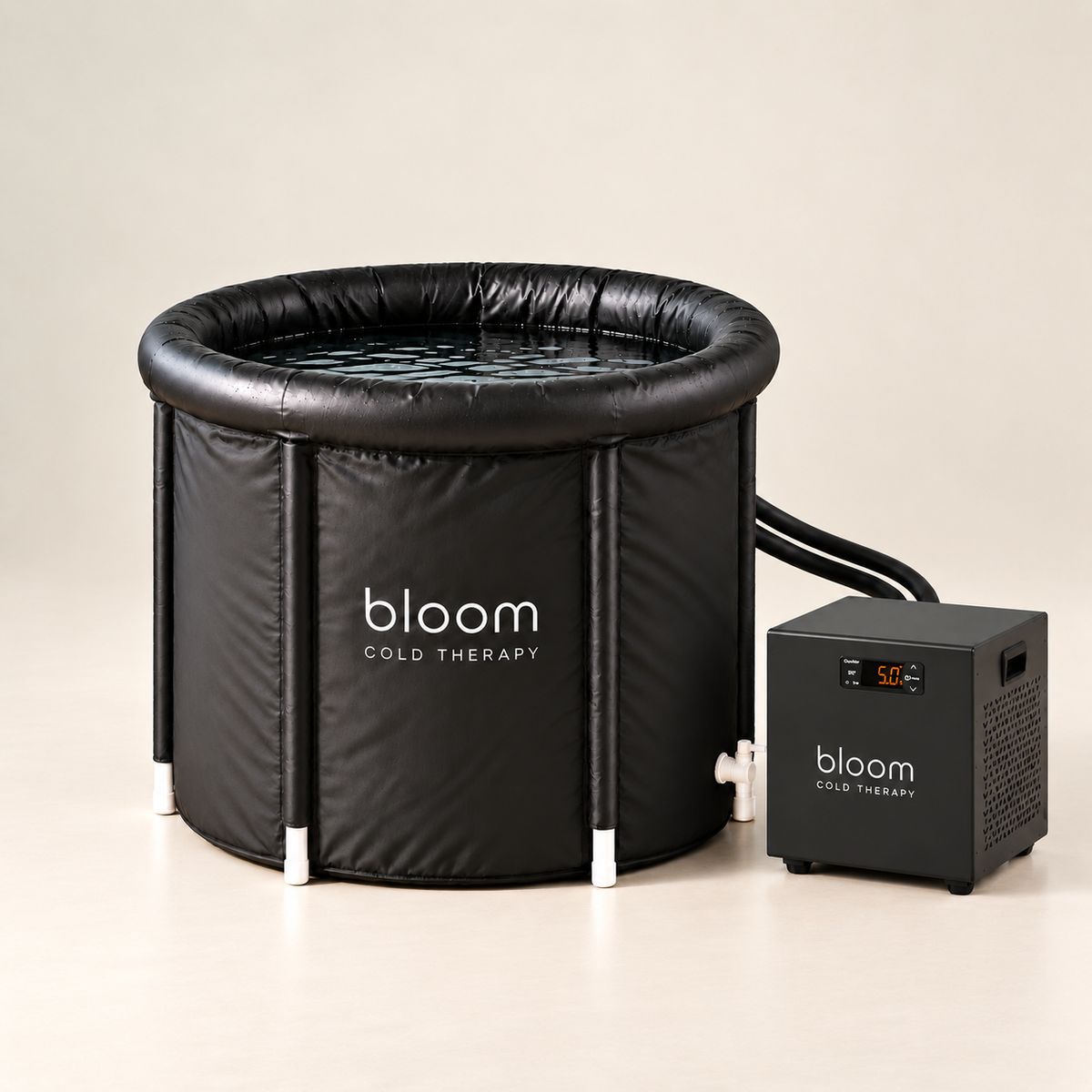 Bloom Ice Core - Set with black round ice bath tub and compact chiller on a soft ivory studio backdrop.