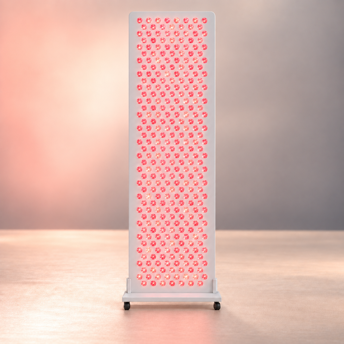 Bloom Red Pro with illuminated staggered lenses on the low floor stand in a soft peach and warm taupe studio
